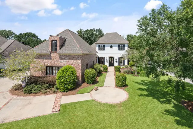 Aerial view of the front elevation and circular drive