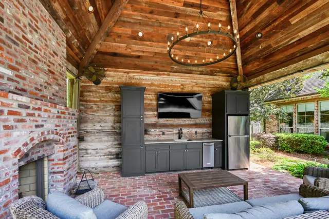 Detached cabana with wet bar and fireplace