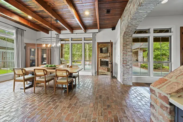Dining room with antique brick floors