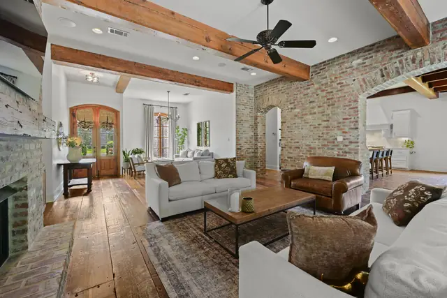 Keeping room with exposed beams, open to the great room