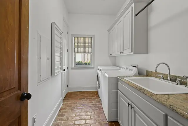 Laundry room with a sink