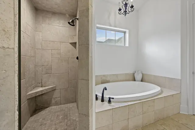 Primary bath with separate shower and soaking tub